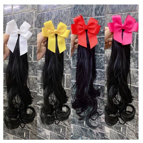 Kẹp tóc nơ xoăn dài cho bé