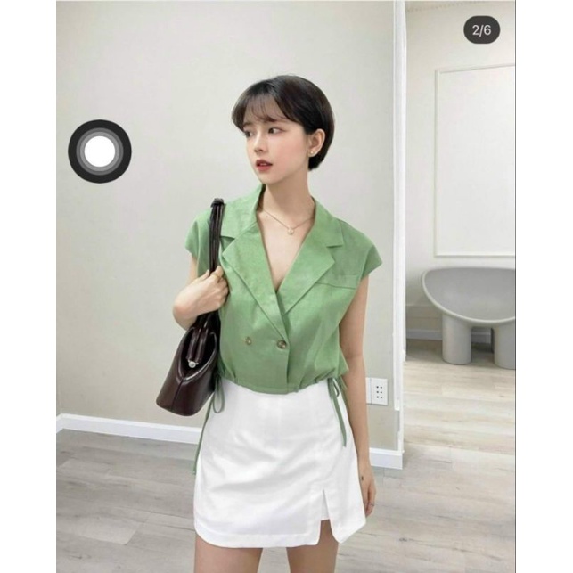 Set áo xanh cổ vest rút dây + chân váy trắng xẻ.