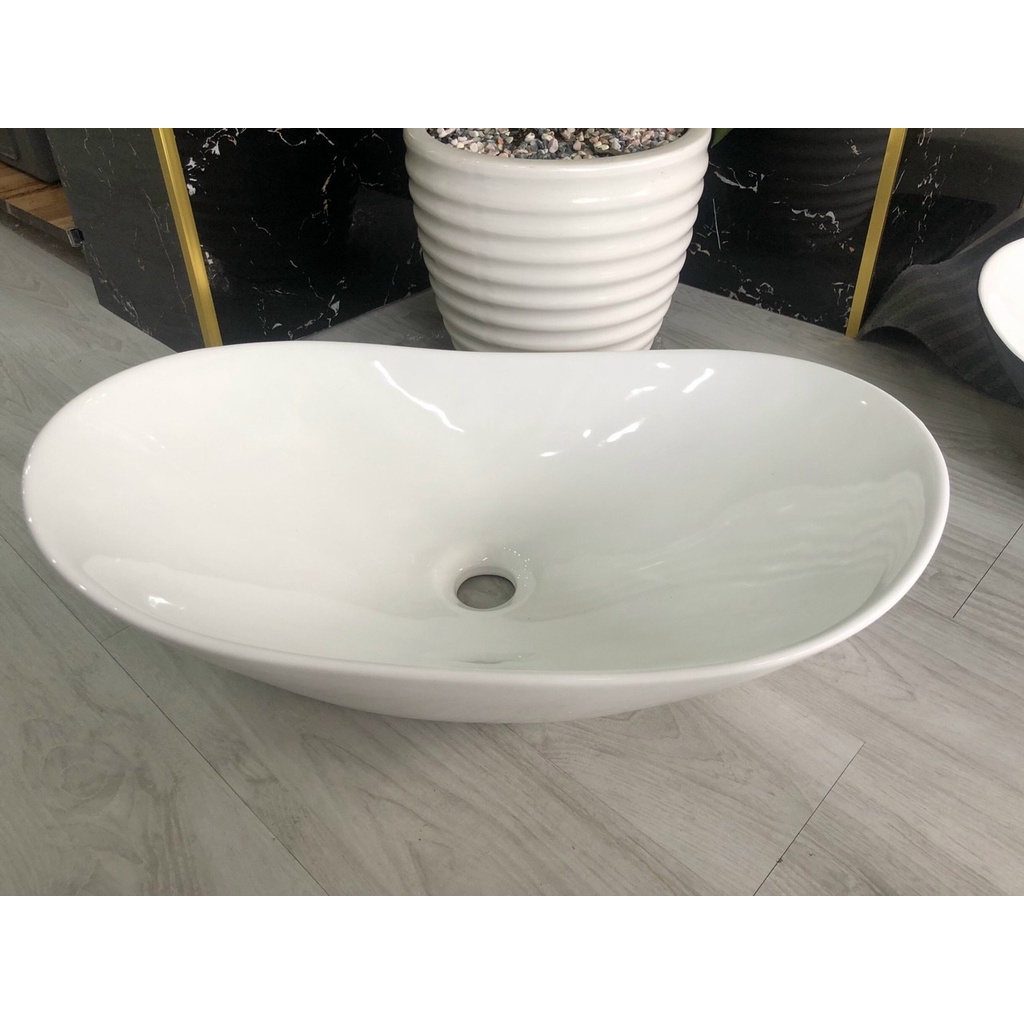 Chậu Lavabo thuyền đặt bàn đá hình thoi màu trắng