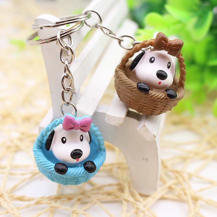 Móc khóa cún ngồi giỏ