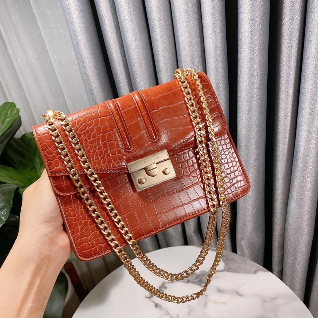 Túi CnK da rắn (2% phí shopee)