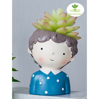 Chậu cây cậu bé áo xanh chấm bi