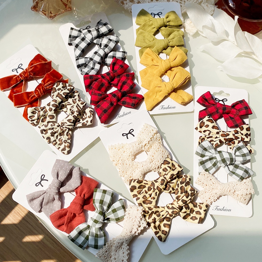 Set 4 Kẹp tóc KIDSBOWS nơ họa tiết da báo xinh xắn thời trang dành cho nữ