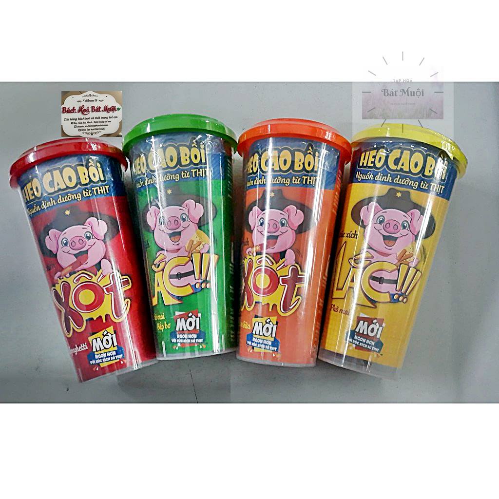Xúc xích lắc Heo Cao Bồi ly 64g