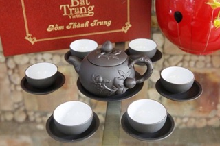 Bộ ấm chén tử sa đắp nổi