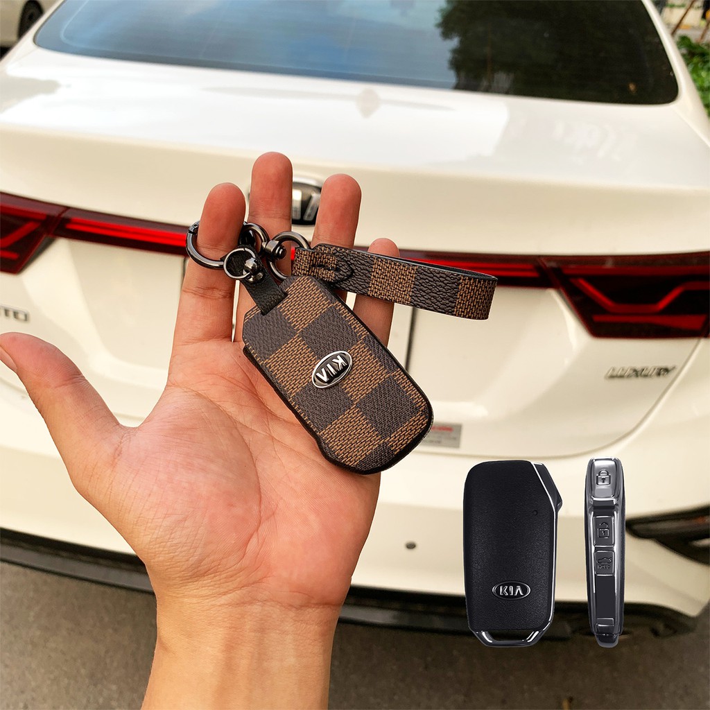 Đựng smartkey Kia Cerato 3 nút bấm handmade da LV KC3V AD có tay cầm