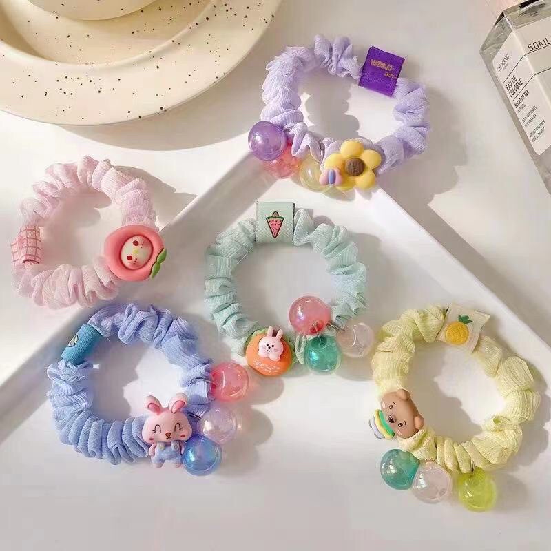 BUÔC TÓC NHÚNG ĐÍNH ICON PHỐI 3 HẠT CHÂU K518