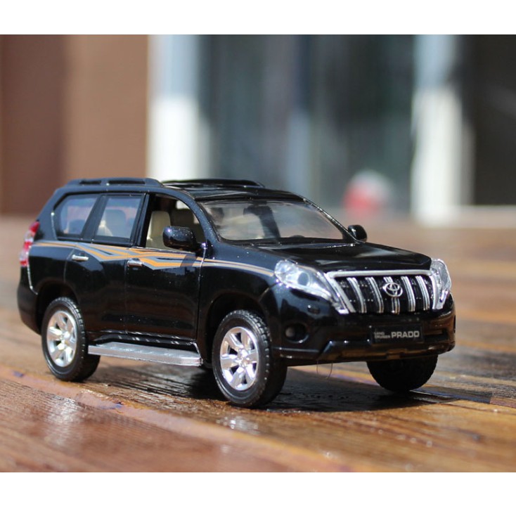 Xe mô hình ô tô Toyota Land cruiser PRADO bằng sắt tỉ lệ 1:32 - Xe ô tô đồ chơi trẻ em mở được cửa có đèn và âm thanh