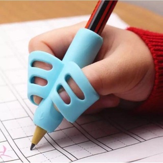 Hỗ trợ cầm bút cho bé - Dụng cụ xỏ ngón silicon chỉnh tư thế cầm bút cho