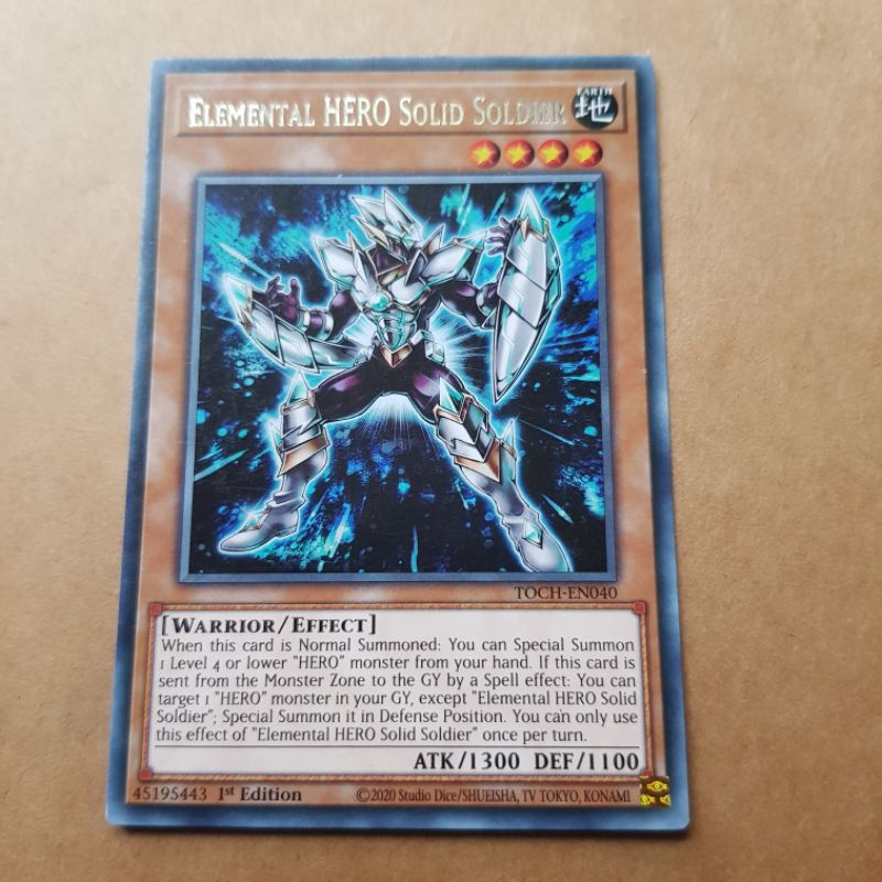thẻ bài tcg Elemental HERO solid soldier (TOCH-EN040 rare)