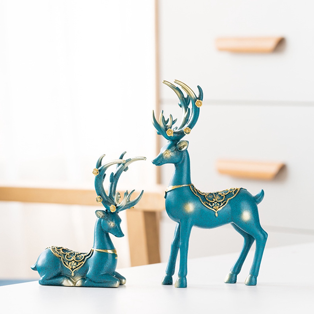 2 tượng hình con nai may mắn làm đồ trang trí