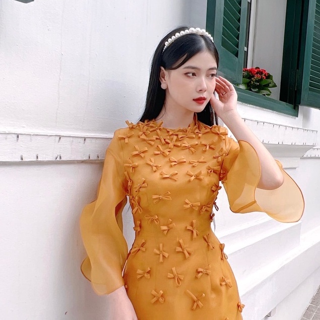 Áo dài cách tân Thiên Kim Mita hình nơ xinh đi dạ hội