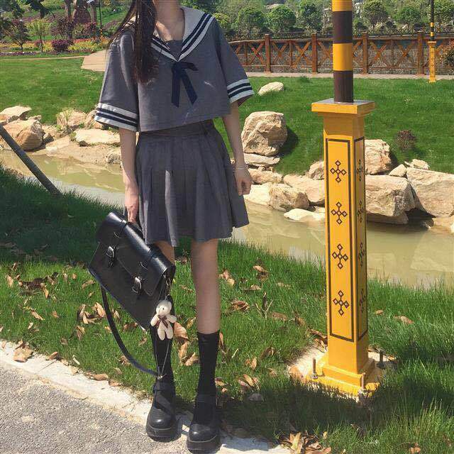 ✥►Phong cách đại học Nhật Bản đồng phục JK hải quân cổ áo ngắn tay trên eo cao màu rắn váy xếp ly nữ mùa hè