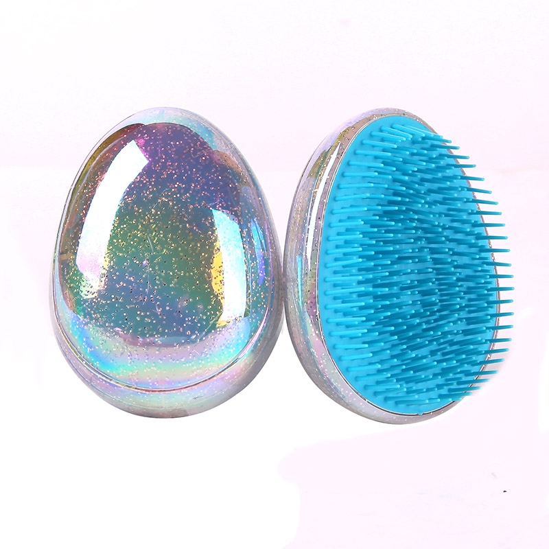 Lược chải massage tóc hình quả trứng bằng nhựa chống tĩnh điện