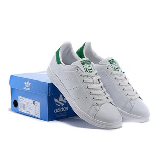 Giày sneaker trắng gót xanh lá