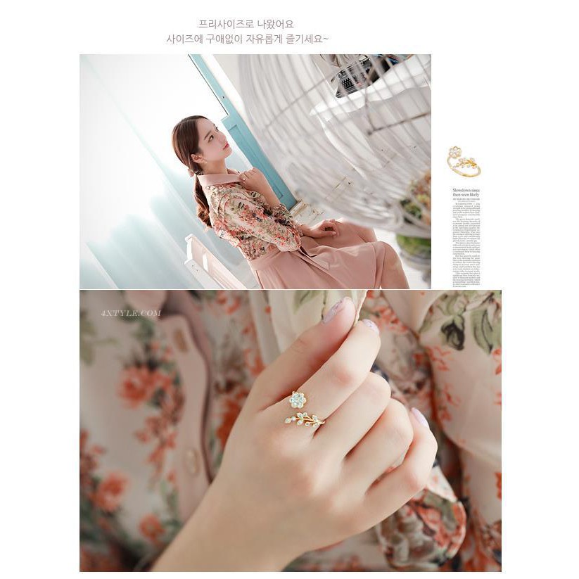 Nhẫn kim cương xoắn hình cánh hoa xinh xắn
