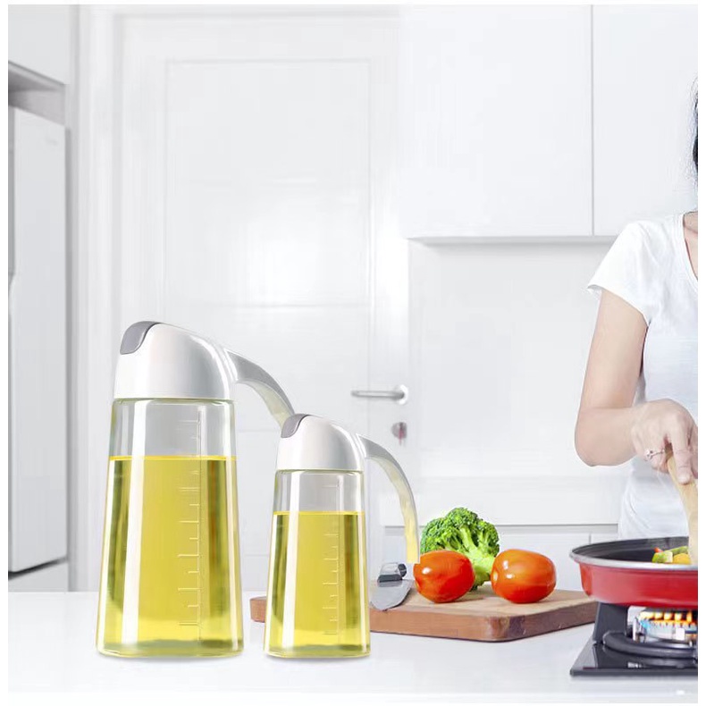Chai đựng dầu ăn, nước mắm xi dầu tự động đóng mở nắp dung tích 630 ML
