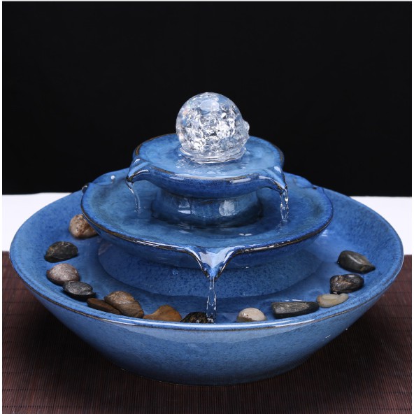 Đài phun nước có bóng thủy tinh phát sáng bày trí phong thủy