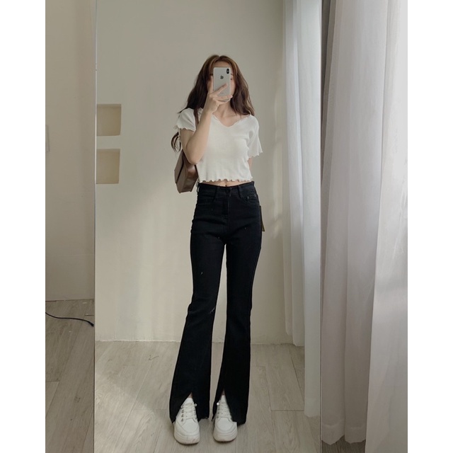 Quần jean ống loe vạt xẻ