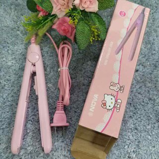 Máy dập xù tóc là tóc mini nova