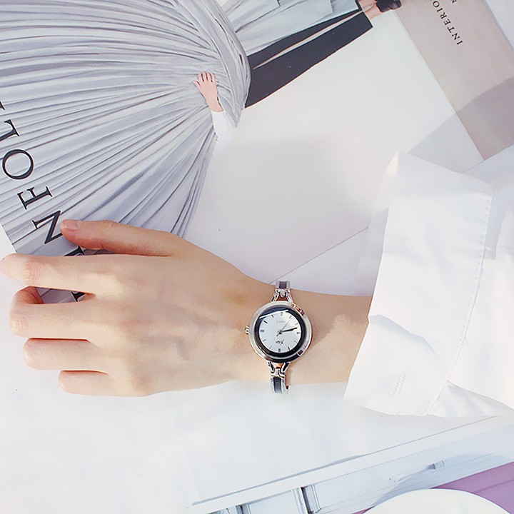 Đồng hồ nữ Jw002 dây thép mặt tròn đa giác 3D Bán lẻ giá sỉ