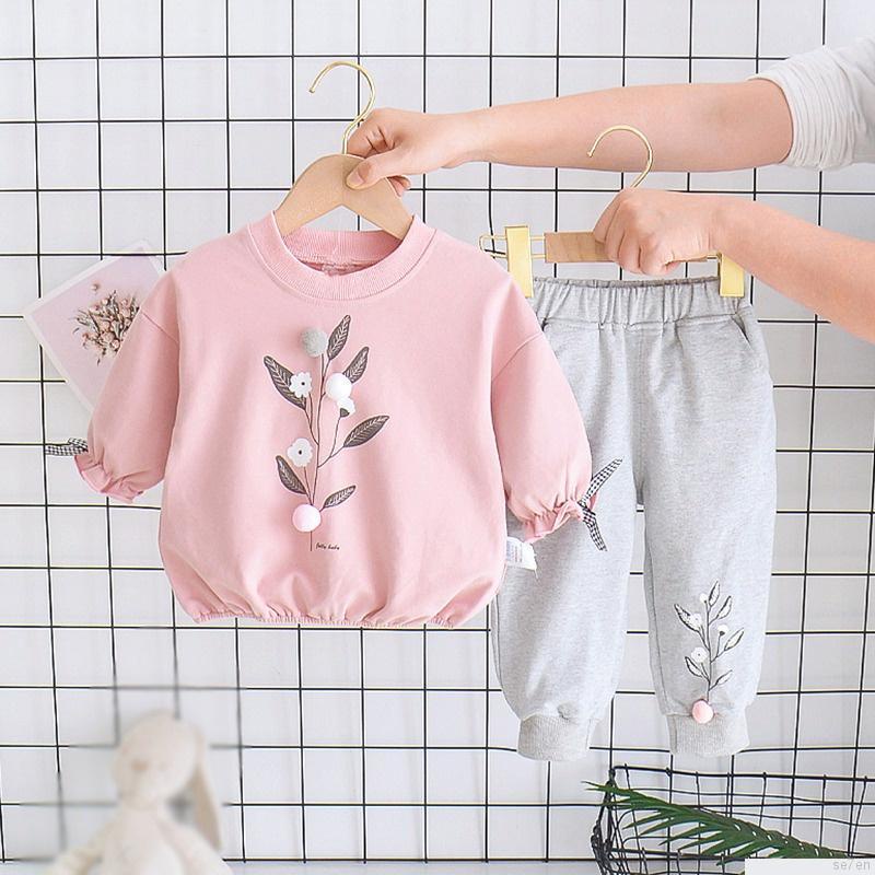 Set áo thun tay dài cổ tròn in họa tiết hoạt hình phối quần dài thời trang mùa thu cho bé gái Se7en