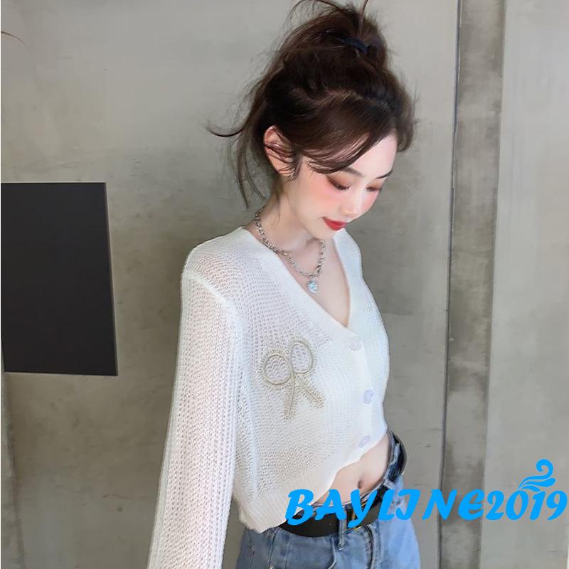 Áo croptop dệt kim tay dài cổ chữ V thêu họa tiết thắt nơ thời trang cho nữ