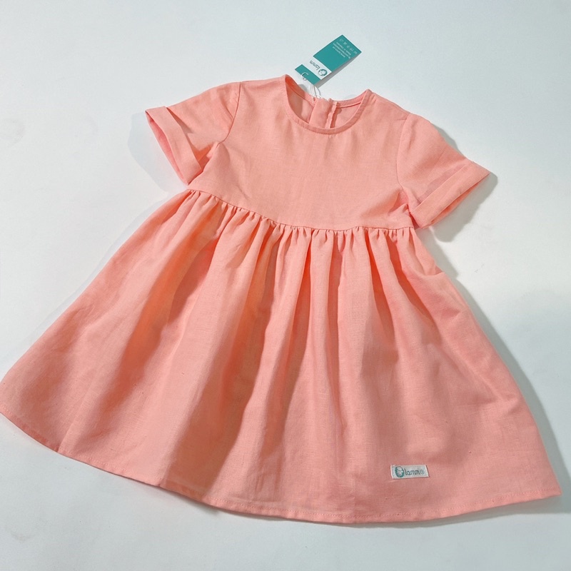 Váy bé gái linen hồng cam tay ngắn dáng babydoll Lamm