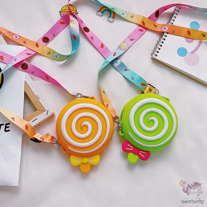 Túi đeo chéo hình kẹo mút đáng yêu dành cho bé gái