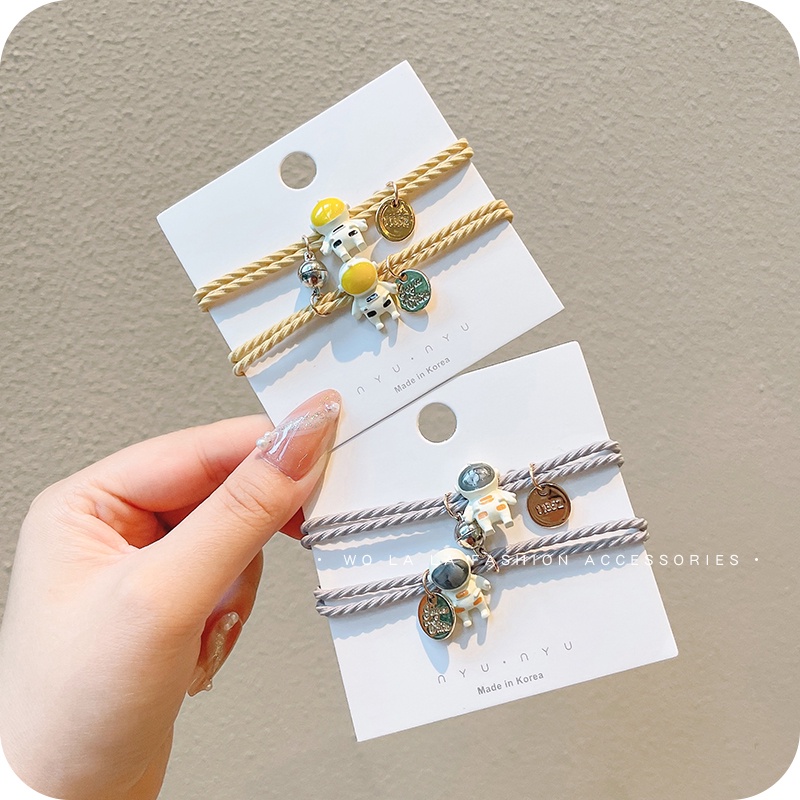 Vòng tay nam châm hình phi hành gia sáng tạo xinh xắn cho cặp đôi