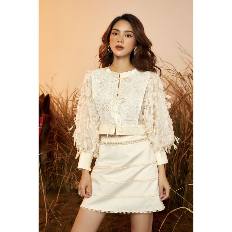 set áo Mollynista tua rua lông vũ + chân váy chữ A viền sang chảnh