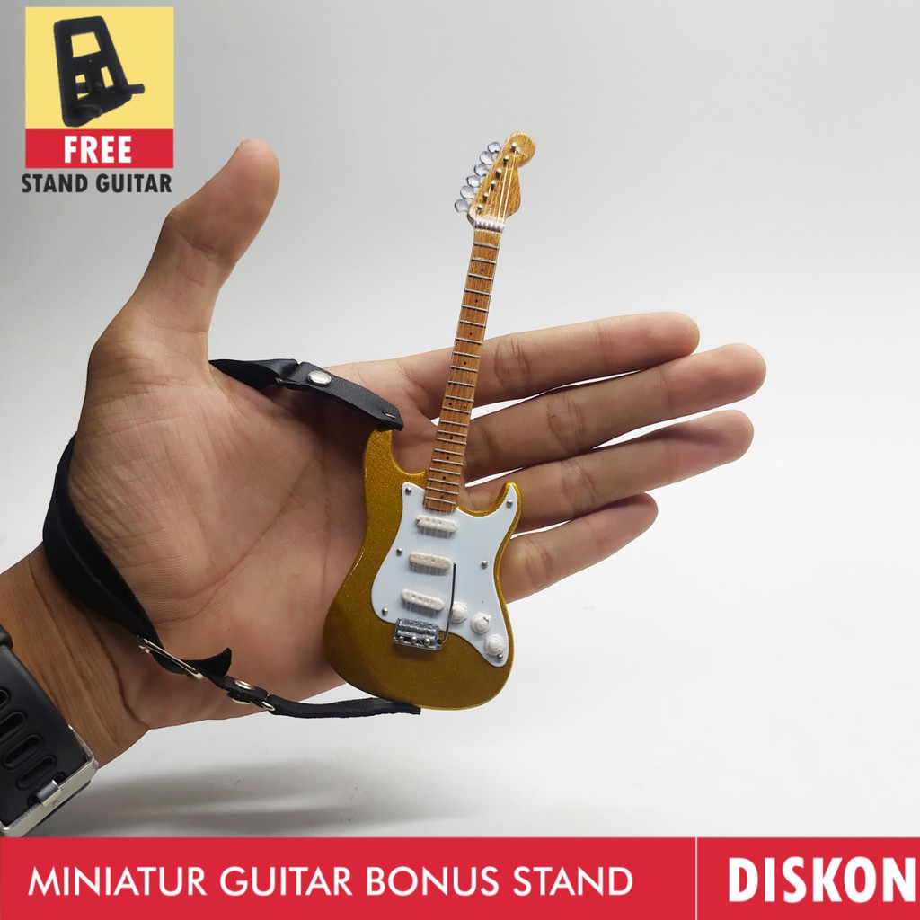 Giá Đỡ Dây Đeo Đàn Guitar Màu Vàng Mini Tiện Dụng