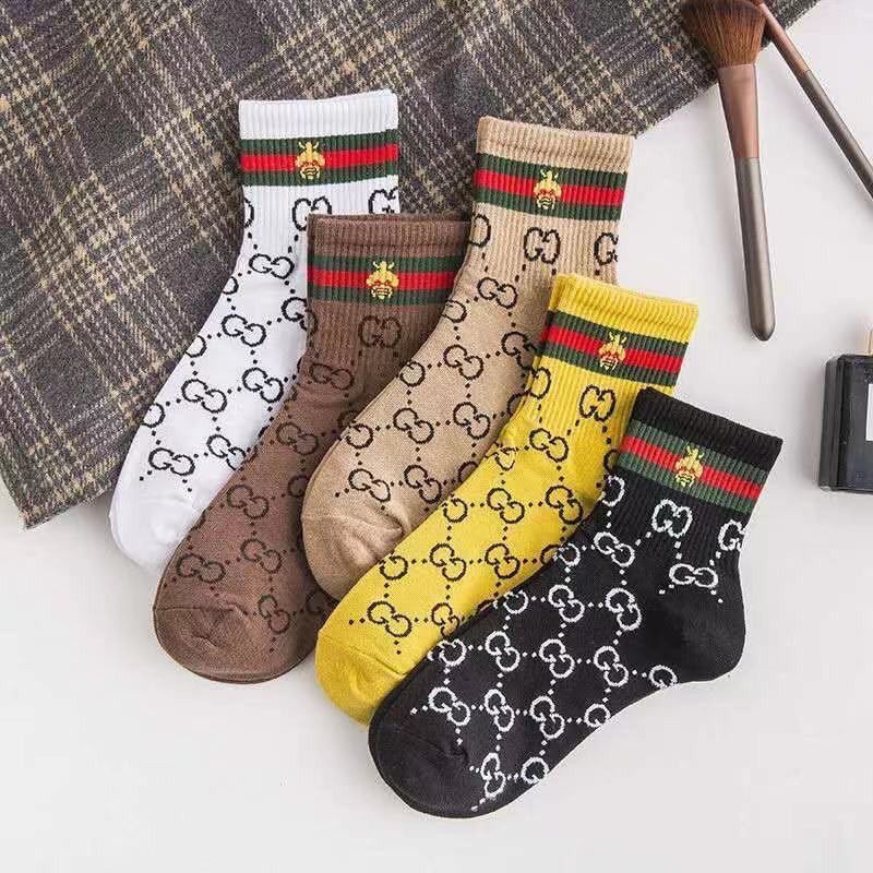 Five pairs of new female socks Korean version of the bee in the tide tube G-shaped socks cotton red netting autumn and winter