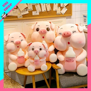 Gấu bông heo ôm bình sữa lợn hồng nhồi bông má to phính bú bình siêu to 1m _ unishop