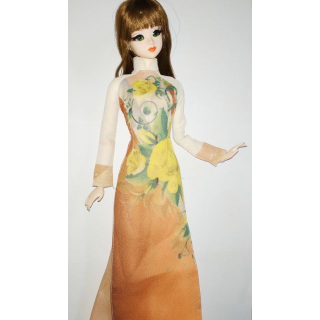 Búp bê áo dài Hân Hân được sản xuất tại Việt Nam với bộ tóc rời bạn có thể thay thế kiểu tóc Theo từng bộ trang phục nhe