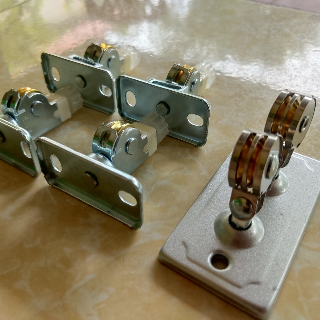 Bộ pully và dẫn hướng cho dàn phơi thông minh tặng 4 nắp chụp