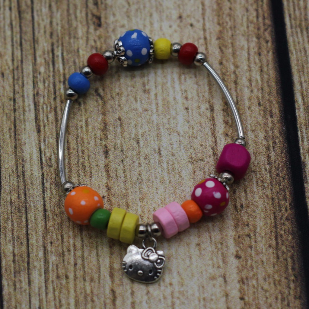 VT30 Vòng tay hạt gỗ mix charm 5 cái/lốc