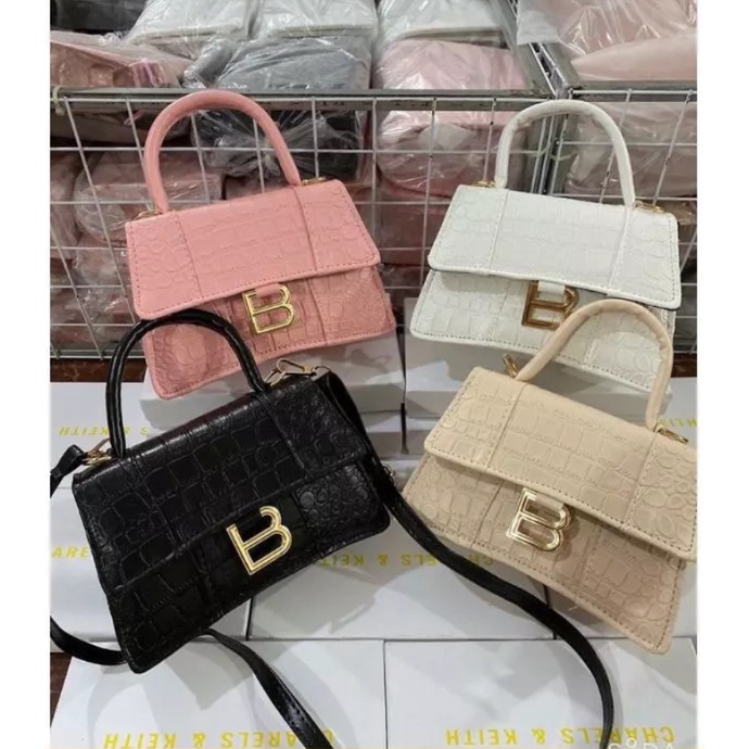 Túi xách đeo chéo nữ sang chảnh khóa BB da rắn dập chìm PK 404