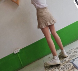 CHÂN VÁY ĐUÔI CÁ ĐÍNH NÚT( chân váy nút)