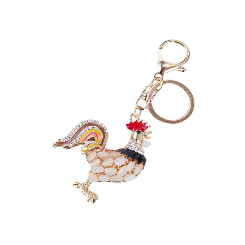Móc khóa có hình gà trống đính đá COD