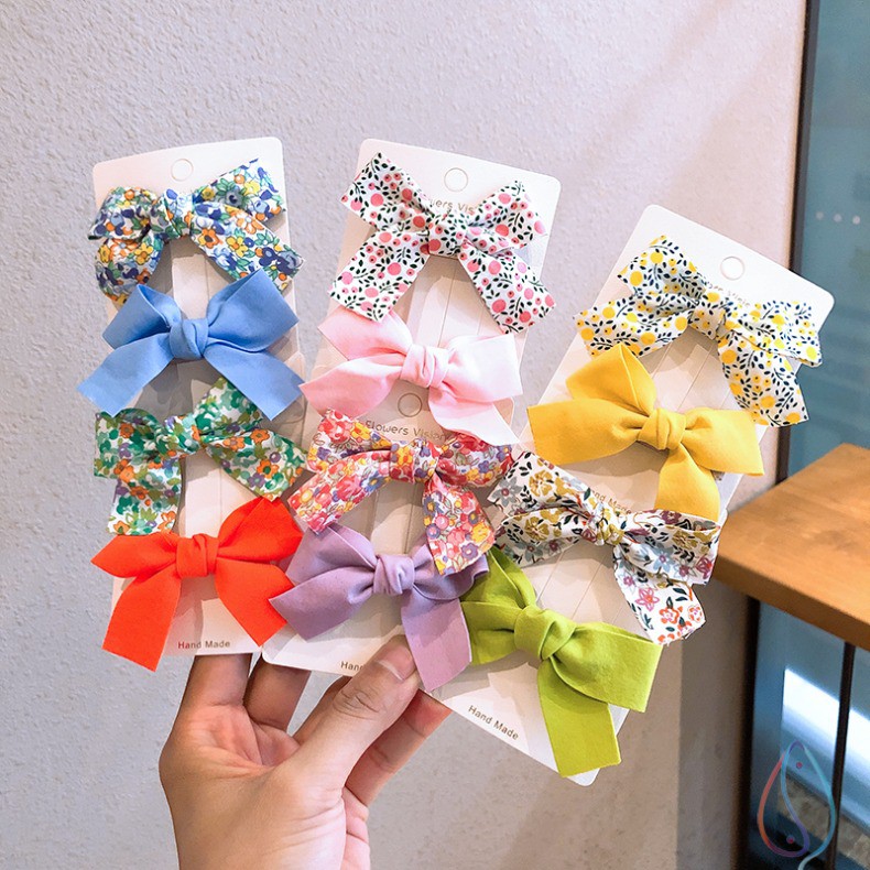 Kẹp tóc cho bé gái set 2 chiếc đính nơ rất dễ thương phiên bản Hàn Quốc