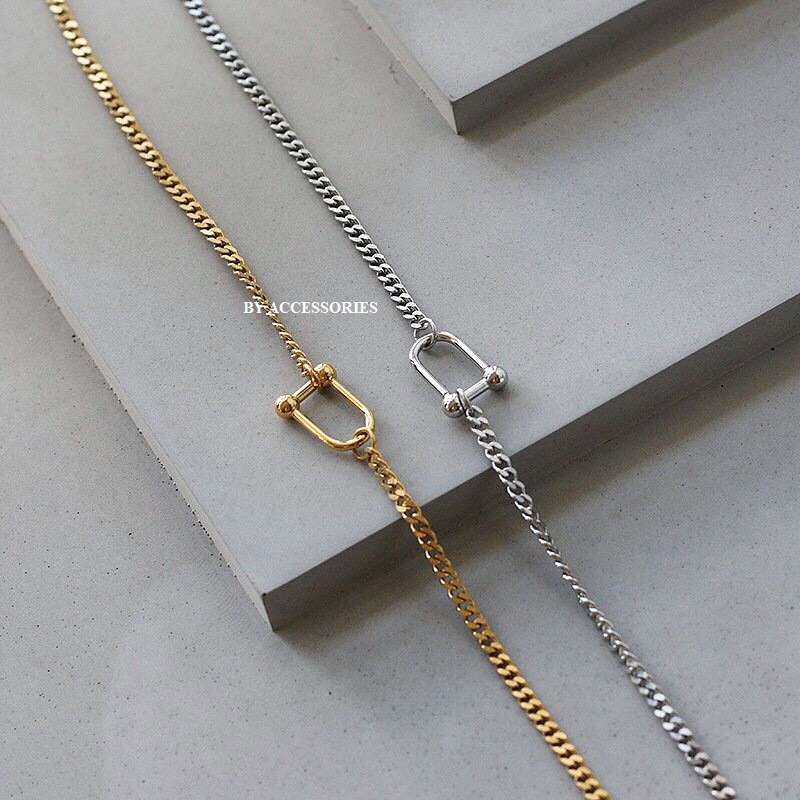 Dây chuyền titan xích phối mặt khóa móng ngựa không gỉ