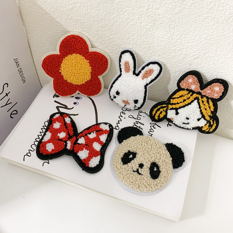 Kẹp tóc hình hoạt họa dành cho bé gái