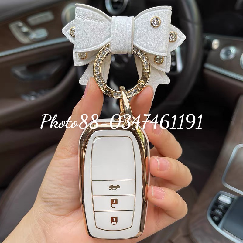 Móc khóa xe ô tô hình chiếc nơ xinh xắn khuyên tròn đính đá