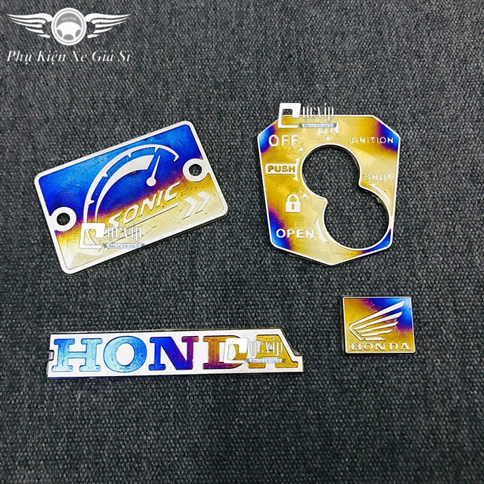 [Rẻ Vô Địch]- (3376) - Bộ 4 Tem Titan Dán Ổ Khóa, Nắp Dầu, Logo Cánh Chim Nhỏ, Logo Honda Cho Xe Vario , Sonic, Winner X