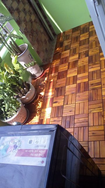 8 tấm ván sàn gỗ lót ban công( sơn pu 3 lớp )