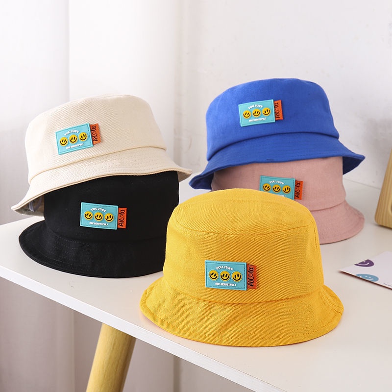 Mũ bucket da họa tiết mặt cười dễ thương cho bé