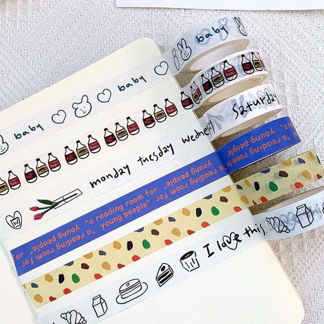 1 cuộn băng dính nhỏ (washi tape) trang trí sổ tay