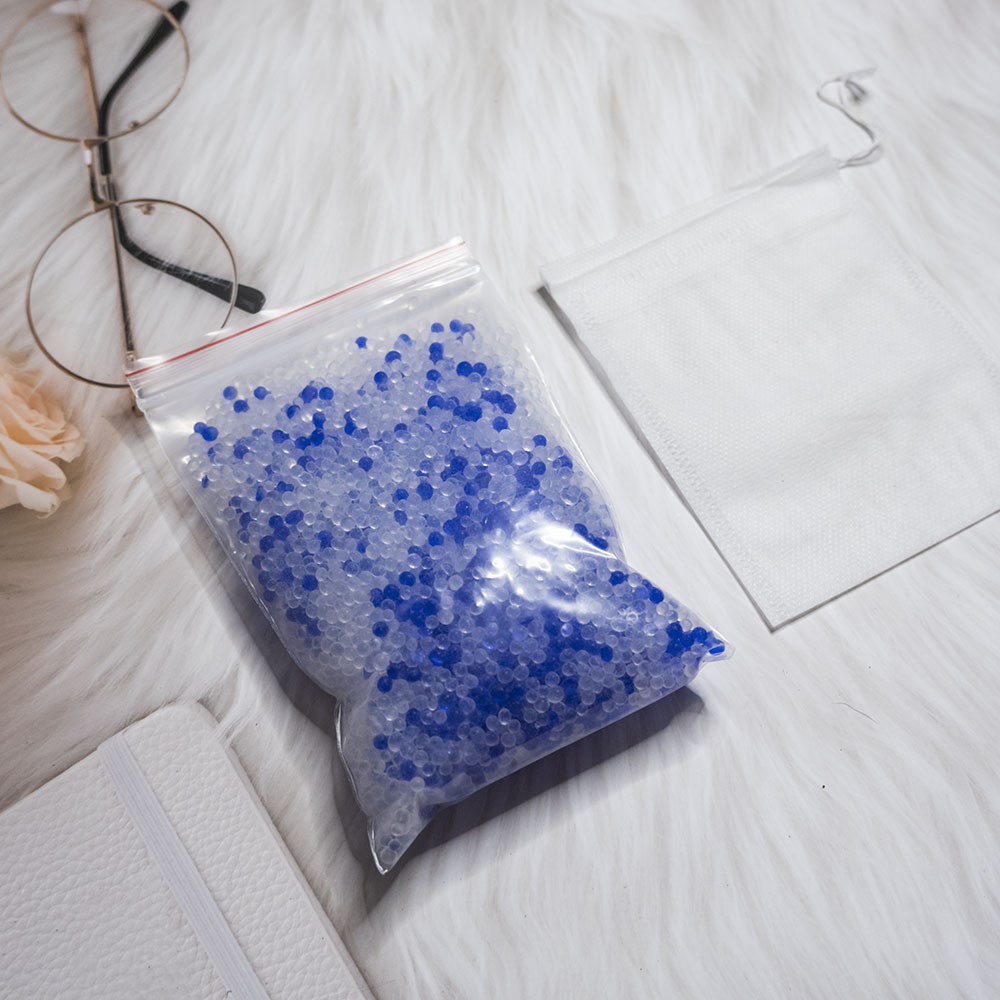 Gói 200g hạt hút ẩm silica gel có hai màu xanh và trắng + tặng kèm túi đựng