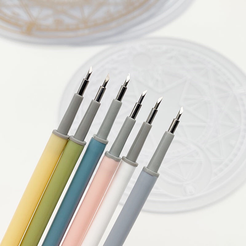Dao rọc giấy dạng bút bi bấm tone màu pastel có đệm lót silicon, lưỡi dao 30 độ sắc bén